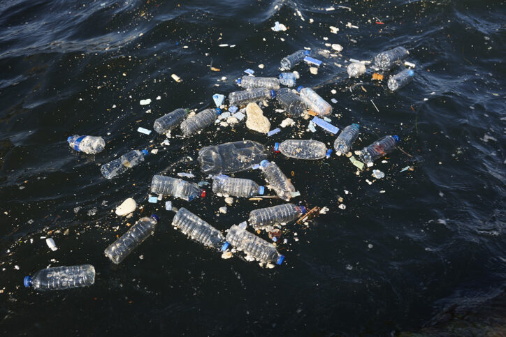 Photo of trash float on the water